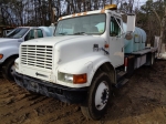 (#30589) 1998 INTERNATIONAL Model 4700 Single Axle Flatbed/Water Truck