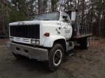 (#30548) 1989 GMC Model 7000 Topkick Single Axle Stake Body Truck