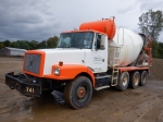 1999 VOLVO Model WG64 Tri-Axle Rear Discharge Mixer Truck, VIN# 4VHJCBUF3XN868502