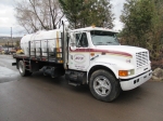 1994 INTERNATIONAL Model 4700 Single Axle Flatbed/Water Truck